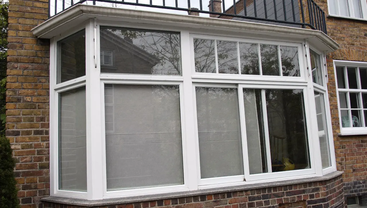 White uPVC sash windows on a Victorian period terrace