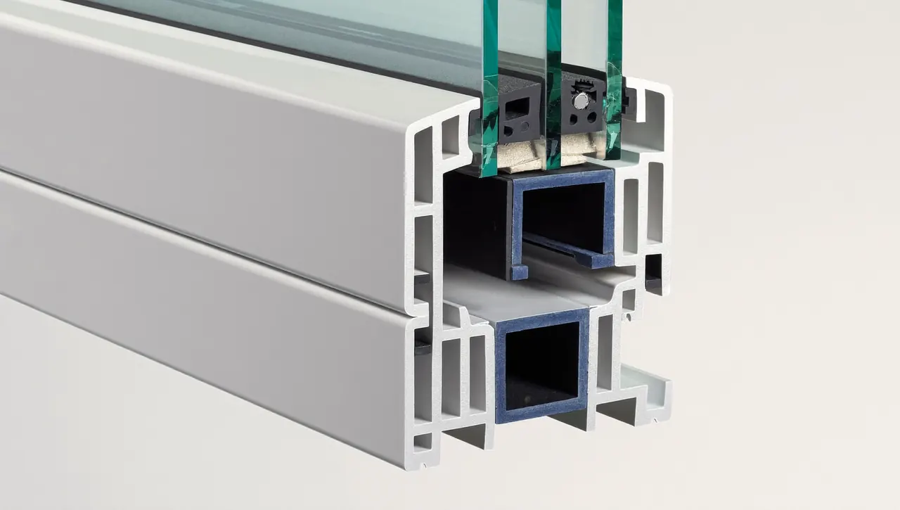 Cut-through of a multi-chamber uPVC window profile shown at survey